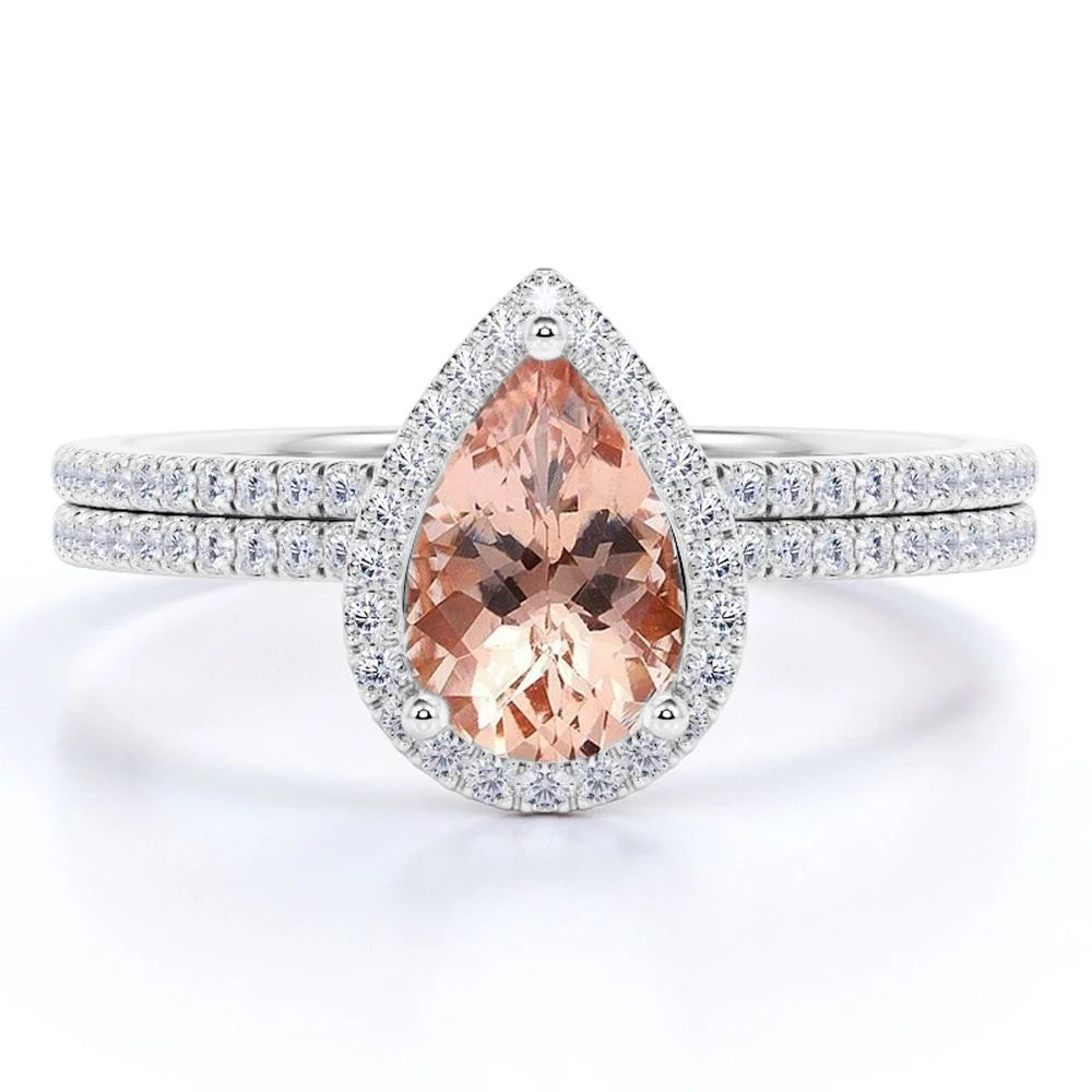 1.25 Carat Pear Cut Lab Created Morganite and Moissanite Bridal Wedding Ring Set with Engagement Ring and Wedding Band in 18K Gold over Silver