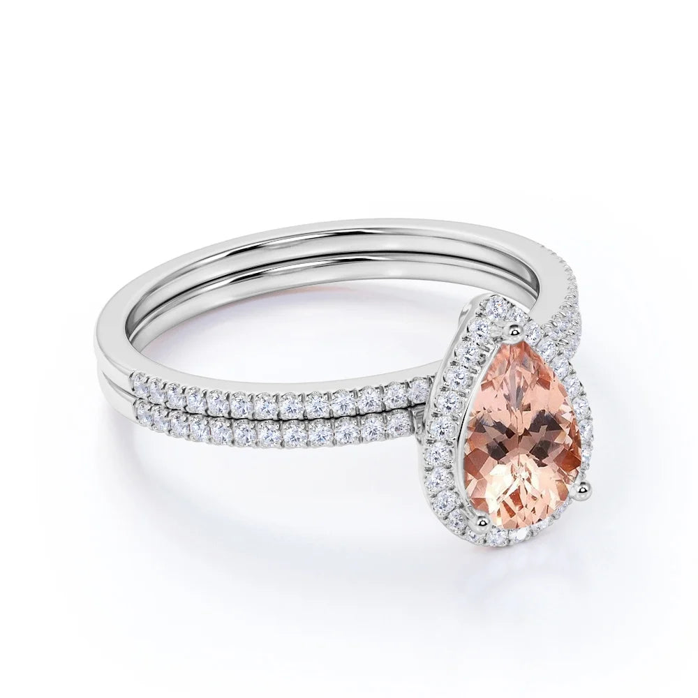 1.25 Carat Pear Cut Lab Created Morganite and Moissanite Bridal Wedding Ring Set with Engagement Ring and Wedding Band in 18K Gold over Silver